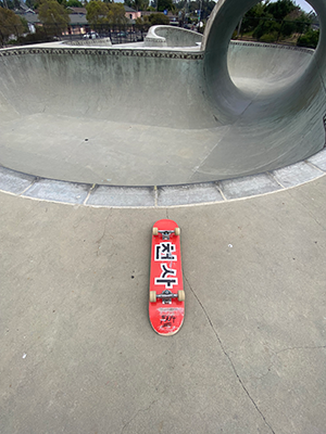Image of my skateboard at the skatepark.